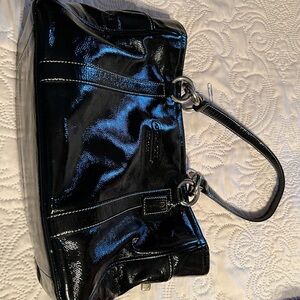 Black and Silver coach bag.